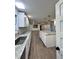 Updated kitchen with white cabinets and granite countertops at 401 Constance St, Walterboro, SC 29488