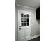 Laundry room with exterior access and black cabinets at 401 Constance St, Walterboro, SC 29488