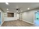 Spacious living room with built-in shelving and hardwood floors at 401 Constance St, Walterboro, SC 29488