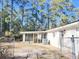 Screened porch with access from the house and fenced yard at 401 Constance St, Walterboro, SC 29488