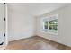 Well-lit bedroom featuring hardwood floors and a window at 1698 Cultivation Ln # 541, Mount Pleasant, SC 29466