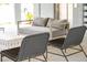 Modern patio furniture with gray cushions and dark wicker chairs at 1698 Cultivation Ln # 541, Mount Pleasant, SC 29466