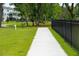 Concrete walkway through green space at 1698 Cultivation Ln # 541, Mount Pleasant, SC 29466