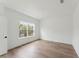 Spacious bedroom with hardwood floors and a window at 1698 Cultivation Ln # 541, Mount Pleasant, SC 29466