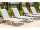 Gray lounge chairs for relaxing by the pool at 1698 Cultivation Ln # 541, Mount Pleasant, SC 29466