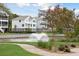Pond-side living with walking paths and flowering trees at 1698 Cultivation Ln # 541, Mount Pleasant, SC 29466