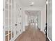 Bright and airy entryway with hardwood floors and french doors at 1698 Cultivation Ln # 541, Mount Pleasant, SC 29466