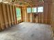 Unfinshed room with wood framing and windows at 119 Ashley Cove Way, Summerville, SC 29483