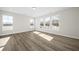 Large living room with hardwood floors and lots of natural light at 119 Ashley Cove Way, Summerville, SC 29483