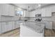 Modern kitchen with white cabinets, granite countertops, and stainless steel appliances at 119 Ashley Cove Way, Summerville, SC 29483