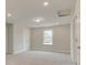 Well-lit bedroom featuring neutral walls and carpet at 119 Ashley Cove Way, Summerville, SC 29483