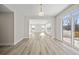 Spacious dining room with hardwood floors and sunlit windows at 119 Ashley Cove Way, Summerville, SC 29483