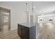Kitchen island with granite countertop and dark cabinets at 119 Ashley Cove Way, Summerville, SC 29483