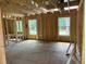 Under construction bedroom with wood framing and windows at 115 Ashley Cove Way, Summerville, SC 29483