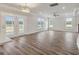 Bright Gathering room with hardwood floors and multiple windows showcasing views of nature at 115 Ashley Cove Way, Summerville, SC 29483