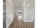Bright entryway with hardwood floors, white trim, and a view into the living room at 115 Ashley Cove Way, Summerville, SC 29483