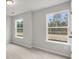 Spacious bedroom with two large windows and neutral decor at 115 Ashley Cove Way, Summerville, SC 29483