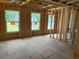 Interior framing with three windows, showcasing construction progress at 115 Ashley Cove Way, Summerville, SC 29483