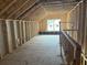 Under construction bonus room with window and framing at 115 Ashley Cove Way, Summerville, SC 29483