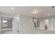 Spacious bonus room with carpet flooring and access to other rooms at 115 Ashley Cove Way, Summerville, SC 29483