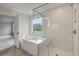 Spa-like bathroom with soaking tub, walk-in shower, and modern design at 115 Ashley Cove Way, Summerville, SC 29483