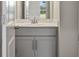 Small powder room with gray vanity and white countertop at 115 Ashley Cove Way, Summerville, SC 29483