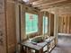 Bathroom vanity installation in progress, showcasing a large window at 115 Ashley Cove Way, Summerville, SC 29483