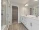 Elegant bathroom with double vanity, large shower, and walk-in closet at 115 Ashley Cove Way, Summerville, SC 29483