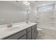Bathroom boasts double vanity, large mirror, and a separate shower/tub at 115 Ashley Cove Way, Summerville, SC 29483