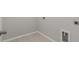 Laundry room with tile flooring and built-in shelving at 115 Ashley Cove Way, Summerville, SC 29483