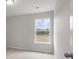 Bright bedroom with neutral walls and a window offering a view at 115 Ashley Cove Way, Summerville, SC 29483