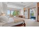 Main bedroom with water views and sitting area at 3067 Marshgate Dr, Seabrook Island, SC 29455