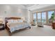 Main bedroom with ocean views and plush bedding at 3067 Marshgate Dr, Seabrook Island, SC 29455