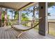 Relaxing deck with a hammock and stunning water views at 3067 Marshgate Dr, Seabrook Island, SC 29455