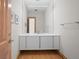 Modern bathroom with floating vanity and large mirror at 3067 Marshgate Dr, Seabrook Island, SC 29455