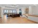 Spacious living room with hardwood floors, fireplace and water views at 3067 Marshgate Dr, Seabrook Island, SC 29455