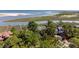 Aerial perspective of a luxury home nestled in a serene waterfront community at 3067 Marshgate Dr, Seabrook Island, SC 29455