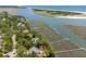 Aerial view showcasing waterfront property with private docks and marsh views at 3067 Marshgate Dr, Seabrook Island, SC 29455