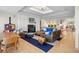 Bright living area with hardwood floors, fireplace and comfortable seating at 3067 Marshgate Dr, Seabrook Island, SC 29455