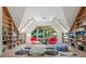 Spacious library with built-in bookshelves and comfortable seating at 3067 Marshgate Dr, Seabrook Island, SC 29455