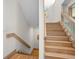 Modern light wood staircase with glass railing at 3067 Marshgate Dr, Seabrook Island, SC 29455