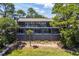 Elevated home with expansive deck overlooking marsh at 3067 Marshgate Dr, Seabrook Island, SC 29455