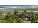 Drone view of waterfront homes with private docks and lush vegetation at 3067 Marshgate Dr, Seabrook Island, SC 29455