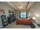 Spacious bedroom with a dresser, TV, and large bed at 1984 Folly Rd # B304, Charleston, SC 29412