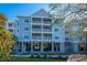 Multi-story building with parking underneath at 1984 Folly Rd # B304, Charleston, SC 29412