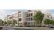 Modern townhouses with balconies and landscaping, located near a street at 618 Waterman St # 618, Charleston, SC 29492