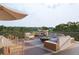 Relaxing rooftop deck with outdoor furniture and scenic views at 618 Waterman St # 618, Charleston, SC 29492