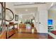 Bright and spacious entryway with hardwood floors and a view to the living room at 202 Needlerush Rd, Kiawah Island, SC 29455