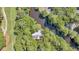 Bird's-eye view of house near pond and golf course at 202 Needlerush Rd, Kiawah Island, SC 29455