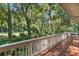 Peaceful deck overlooking a lush green landscape at 202 Needlerush Rd, Kiawah Island, SC 29455